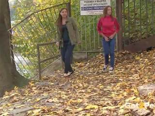 Brunette friends piss together by river, reged video b0