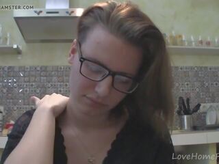 Solo damsel with glasses chatting in the kitchen
